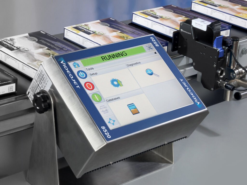 TIJ Printer on a conveyor line with the food packets coding
